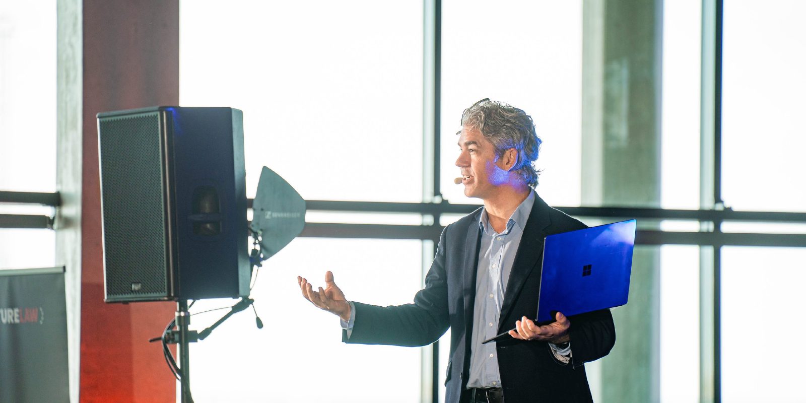 Damien Riehl in conversation at a legal-technology conference.